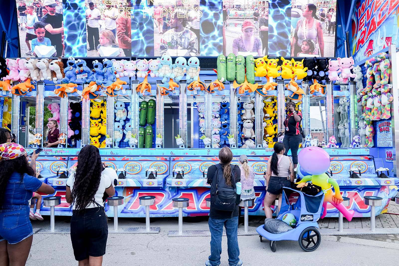 Water Race carnival game with water guns and targets