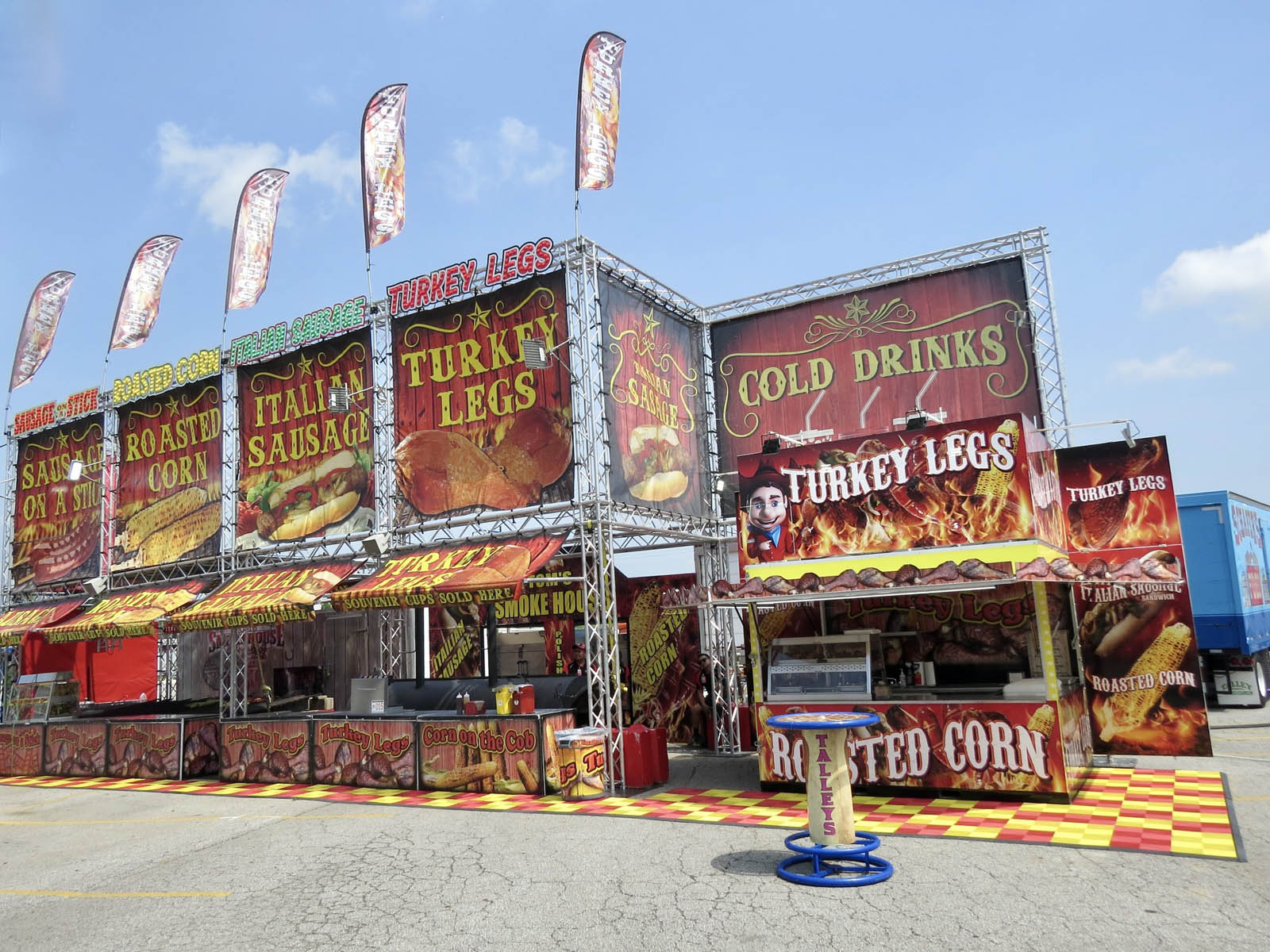 Bacon-wrapped fair food and chili cheese dogs on the midway