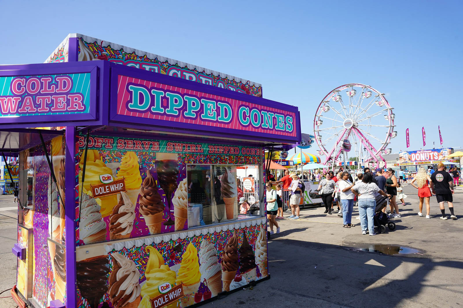 Soft serve ice cream cone dipped in chocolate coating
