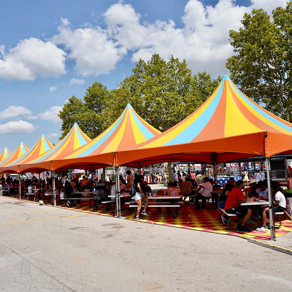 Food tables and covering tents on the Talley Amusements midway
