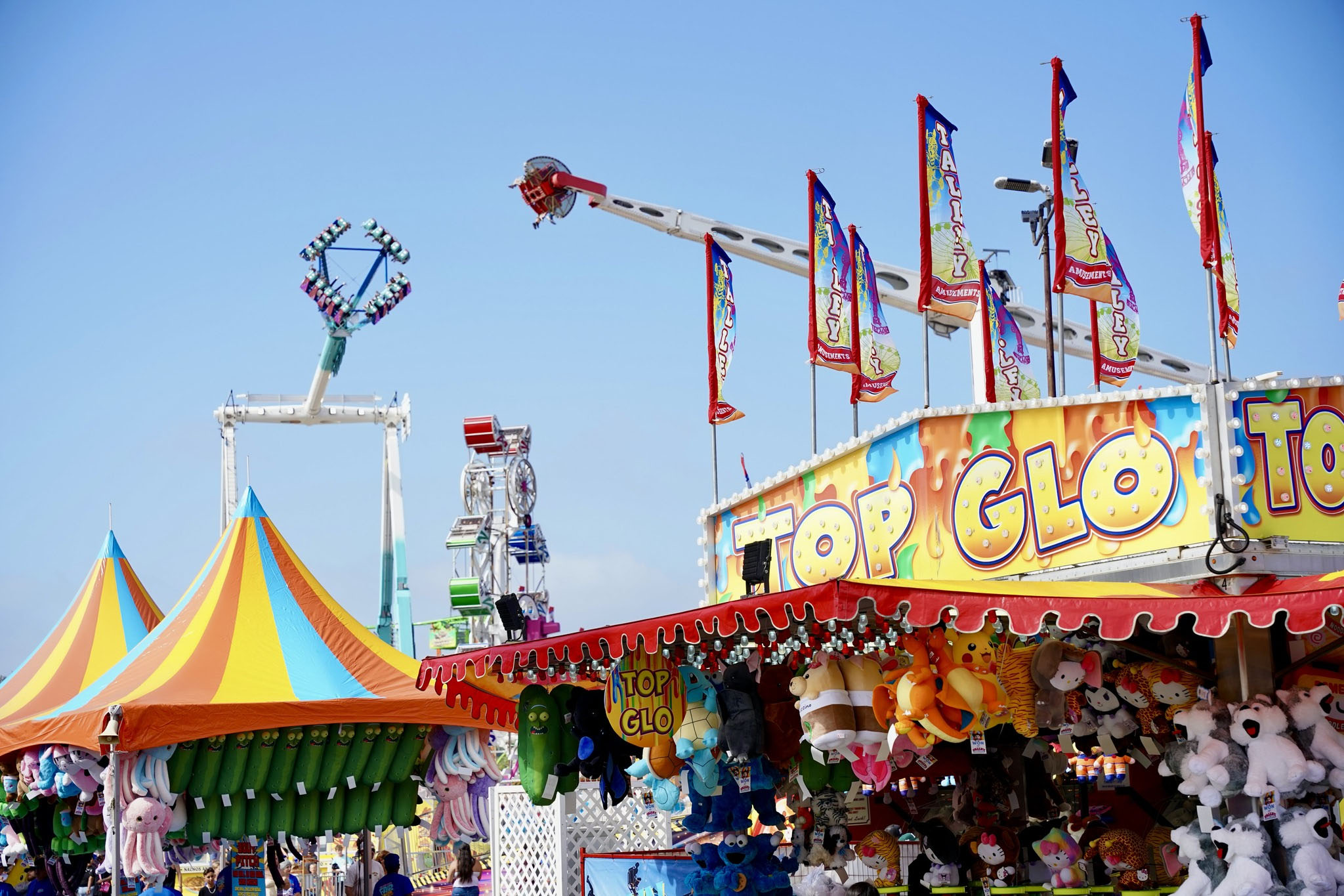 Light-up water gun race game at night fair