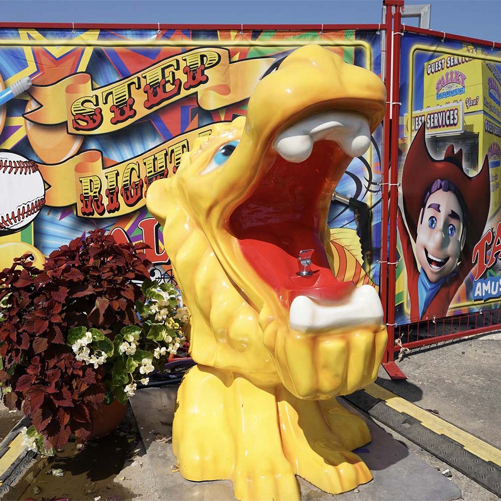 Dragon-themed water fountain on Talley midway